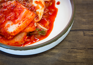 丸万都食品について