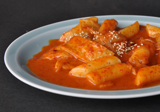 丸万都食品について